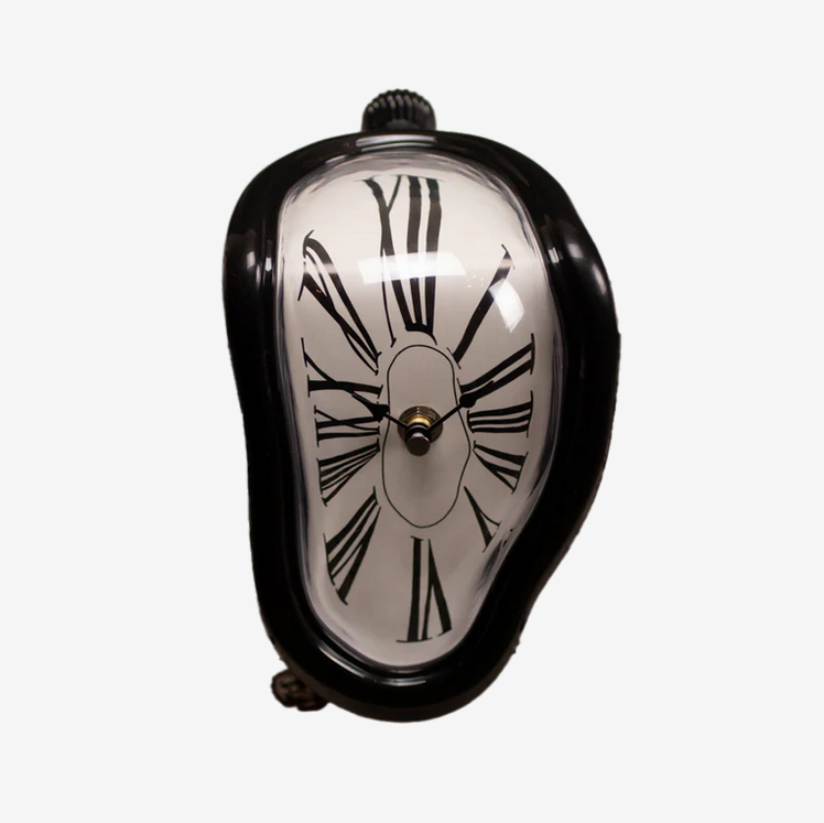 melting clock resting on the edge of a metal bookshelf next to books