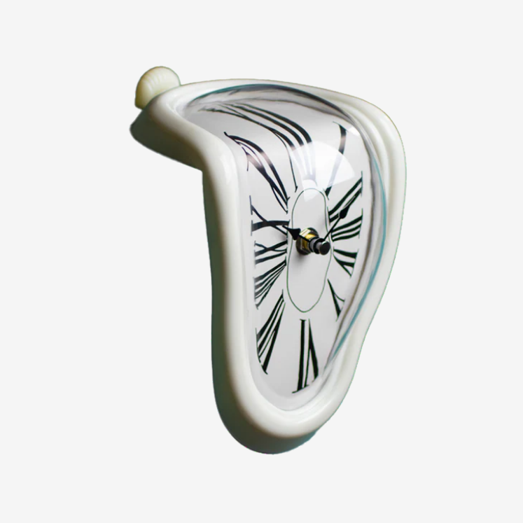 Silver surrealist melting clock resting on the edge of a metal bookshelf next to books